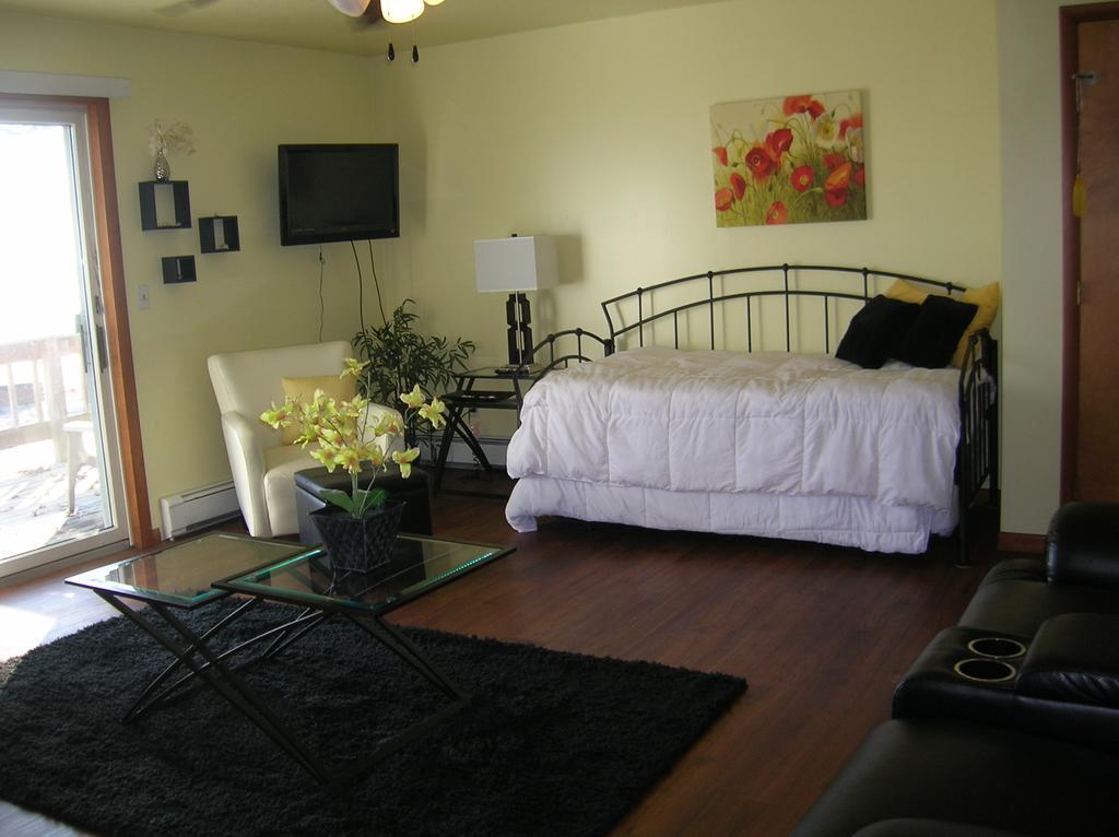 Camp Inn Lodge Oscoda Habitación foto