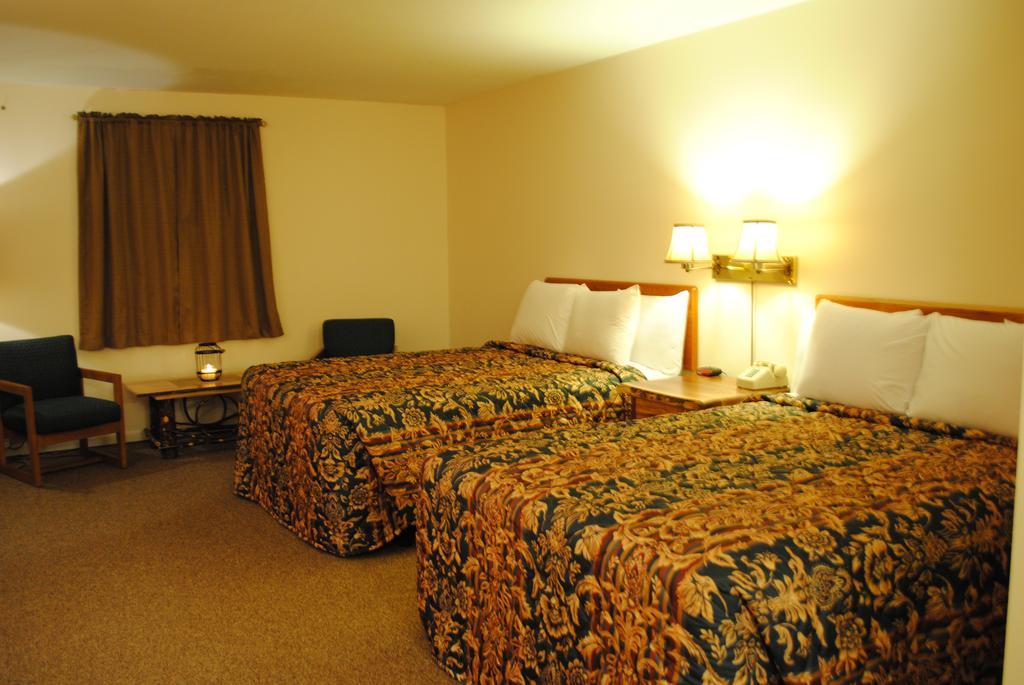 Camp Inn Lodge Oscoda Habitación foto